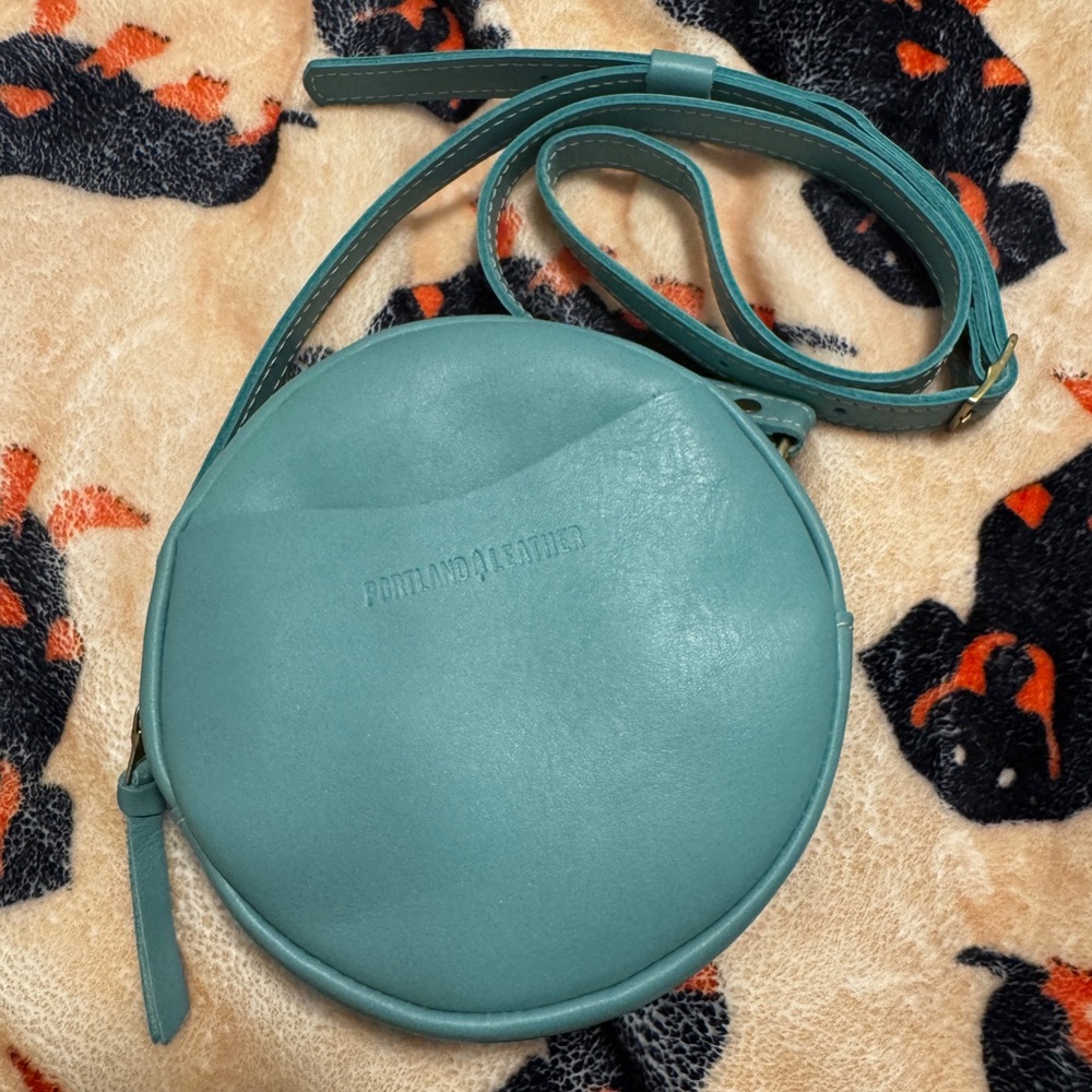 Portland Leather Teal “Optical” Almost Perfect Circle Crossbody Bag